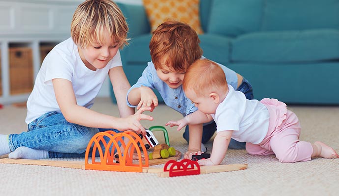 Children playing on carpet
