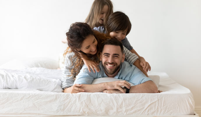 Family enjoying on a clean mattress