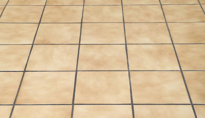 Dirty ceramic tile with visible stain