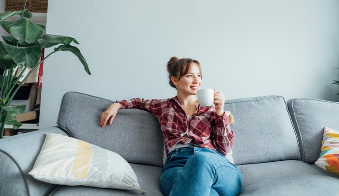 Person sitting on sofa